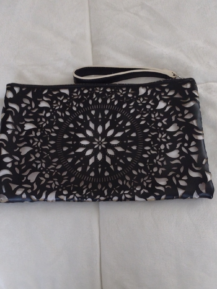 Carlos By Carlos Santana Black And White Laser-Cut Wristlet Clutch